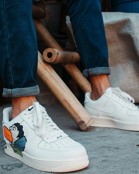 Person Wearing White Nike Air Force 1 Sneakers · Free Stock Photo