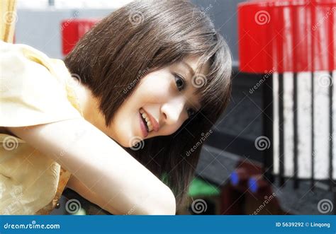 A Chinese Girl with a Smile. Stock Photo - Image of young, asian: 5639292