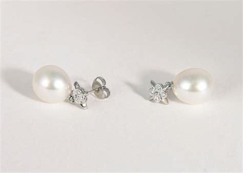 Classic Tiffany and Co. Platinum Pearl and Diamond Earrings at 1stDibs