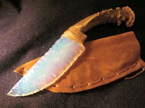 An Incredible Native American blue fire opal stone knife with deer antler handle and sinew ...