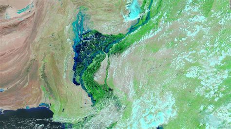 Pakistan's deadly floods created a huge inland lake 100 kilometers wide, according to satellite ...