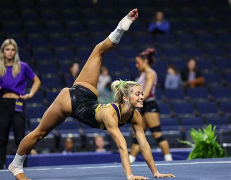 Olivia Dunne In Her Tiny Leopard Print Bikini Performs Insane Backflip