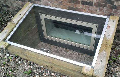 Learn how to easily install an egress window well. | Basement window well covers, Basement ...