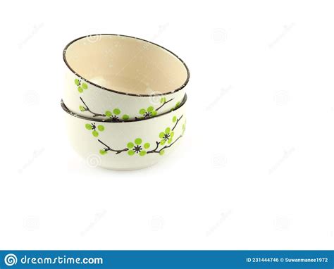 Empty Stack Beige Ceramic Bowl with Brown Rim and Green Flora Pattern Isolated on a White ...
