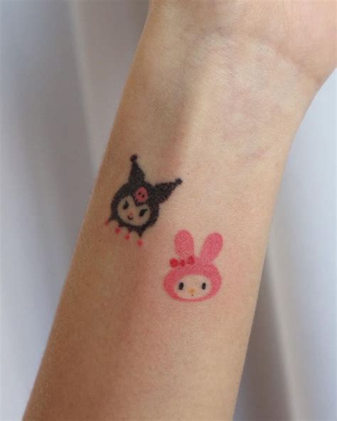 Pin by 𝕸𝖆𝖗𝖙𝖎𝖓𝖆 on BODY ART | Hello kitty tattoos, Tattoos, Cute tattoos