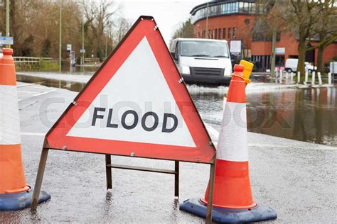 Warning Traffic Sign On Flooded Road | Stock image | Colourbox