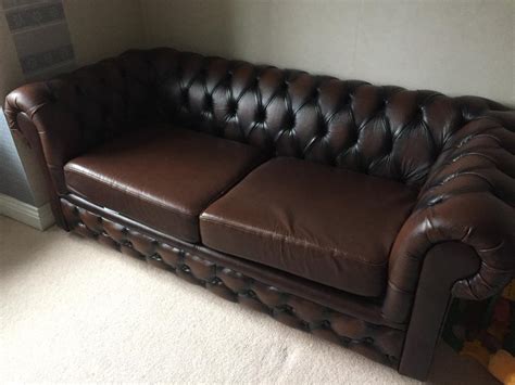Dark brown leather chesterfield sofa bed | in St Austell, Cornwall | Gumtree