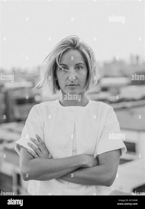 Natural blonde model with Manhattan skyline Stock Photo - Alamy