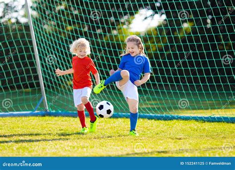 Kids Play Football. Child at Soccer Field Stock Image - Image of little ...