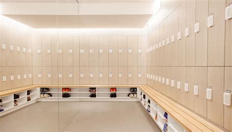 Light filled locker room for office building by Five at Heart. | Office lockers, Locker designs ...