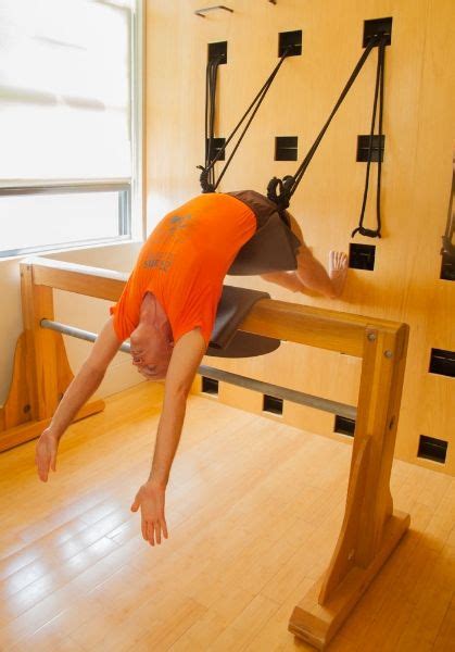 Iyengar yoga – using props to help you achieve maximum results. backbending over the trestler ...