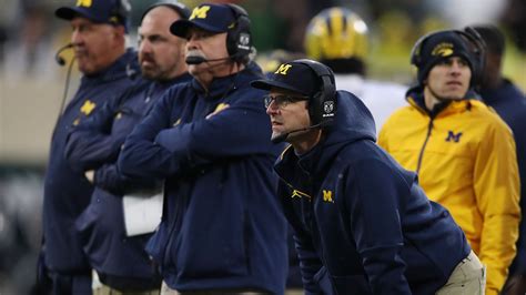 Michigan football coaching staff's two different, effective approaches