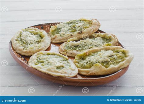 Mexican Sopes with Grated Cheese and Green Salsa, Mexican Food Spicy in Mexico Stock Image ...