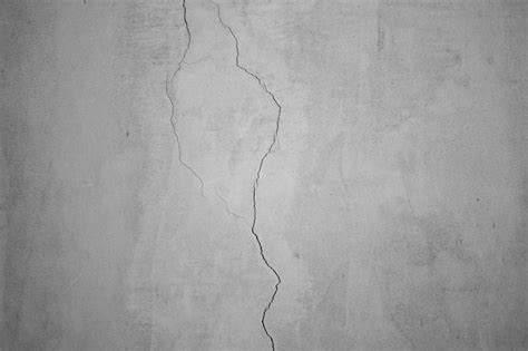 Premium Photo | Crack on the wall texture cracked damaged wall cracked wall surface