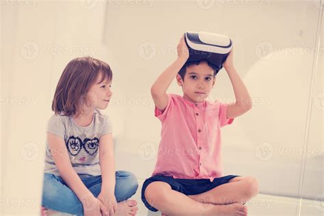kids using virtual reality headsets at home 10400300 Stock Photo at Vecteezy