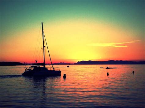 Premium Photo | Silhouette boat sailing in sea during sunset