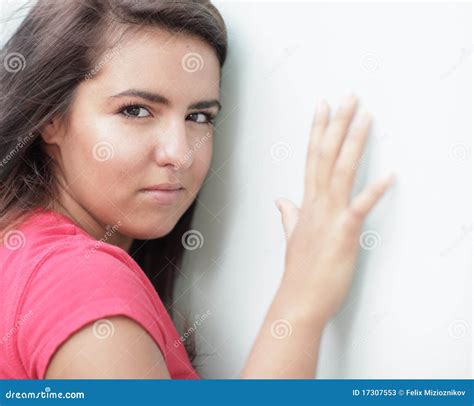 Woman with Hand on the Wall Stock Image - Image of leaning, daytime ...