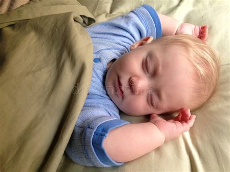 Baby Boy Sleeping Peacefully Stock Photo - Image of cuddling, cuddle ...