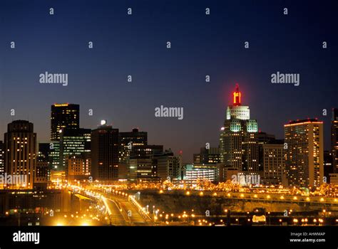 SKYLINE OF ST. PAUL, MINNESOTA AT DUSK WITH MOVING LIGHTS OF TRAFFIC ...