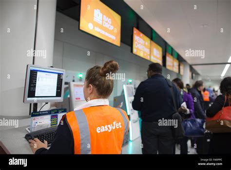 Christmas holiday makers check in at the easyJet bag drop facilities ...