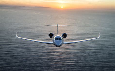 Gulfstream G650 Business Jet Cruising on Sunset Scene - Aircraft Wallpaper Flying Magazine