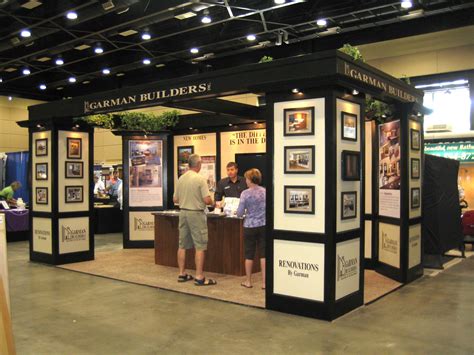 Garman Builders show booth, nice display, great columns with photo area | Design center showroom ...