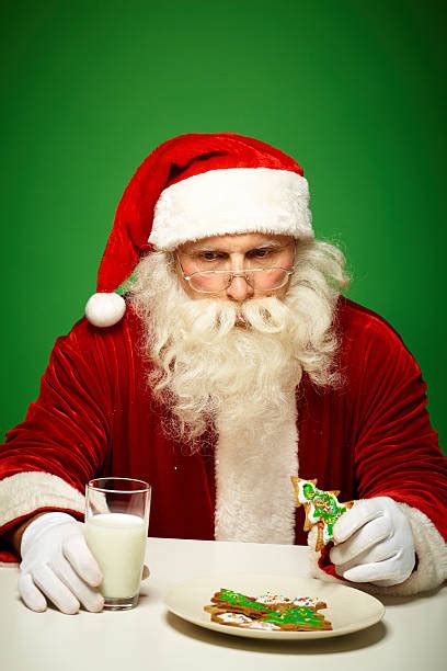 Santa Eating Cookies Stock Photos, Pictures & Royalty-Free Images - iStock