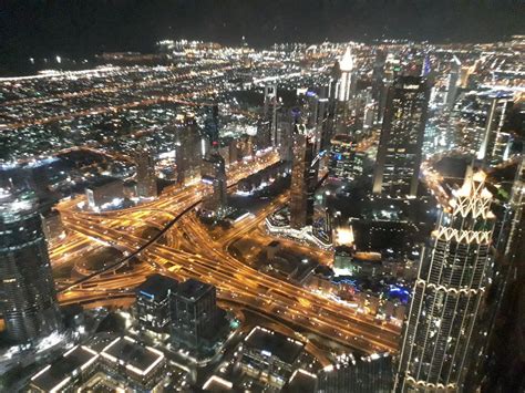 Aerial view of Dubai at night | Aerial view, Dubai buildings, Dubai city