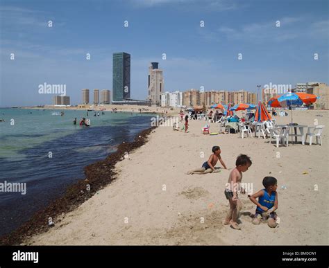 Children playing on a beach in central Tripoli, Libya Stock Photo - Alamy