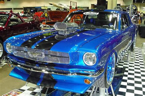 Ford mustang custom paint job | classic Mustang wearing an electric blue paint job and plenty of ...