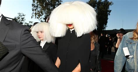 Why Does Sia Cover Her Face? Here's the Scoop