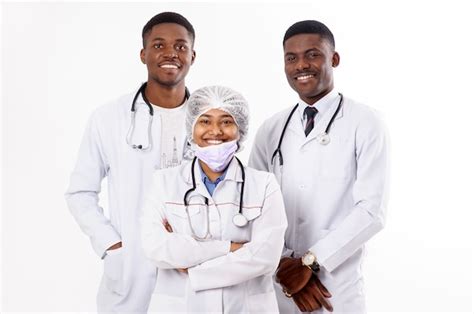 Premium Photo | Three doctors on a white. indian woman with a stethoscope. african men.