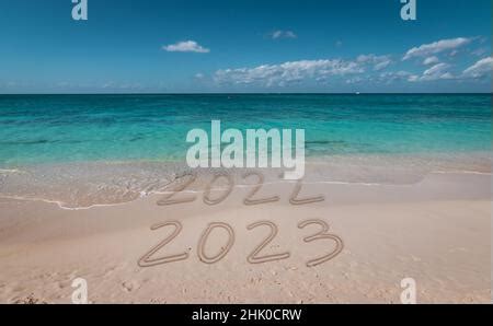 New 2023 Year Concept. Sand Falling in Hourglass Taking the Shape from 2022 to 2023 year on a ...