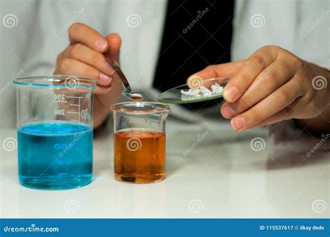 Chemistry experiment stock image. Image of equipment - 115537617