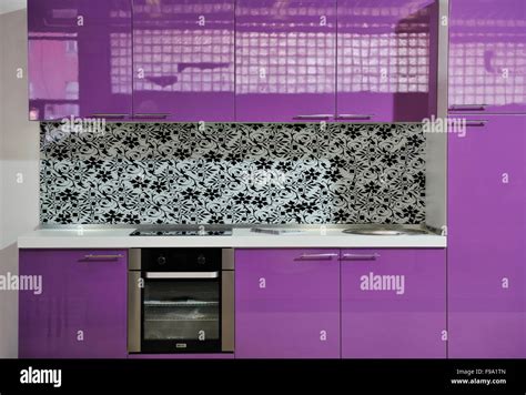 modern kitchen interior with pink furniture Stock Photo - Alamy