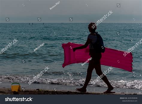 Silhouette People Walking On Beach Unrecognisable Stock Photo ...