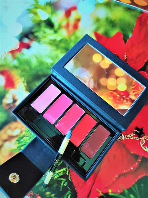 The Dior Holiday Couture Collection Daring Lip Palette features five lip products. It has a ...