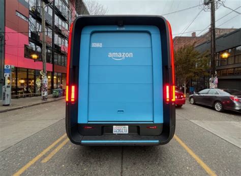 'It's like driving a spaceship': Amazon's Rivian electric delivery vans ...