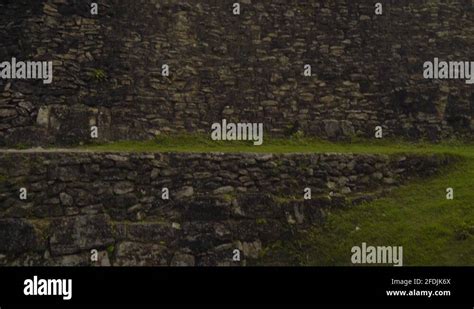 Tilt up to Xunantunich Mayan carvings on the pyramid in Belize, old Stock Video Footage - Alamy