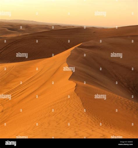 Desert at sunset, Dubai UAE Stock Photo - Alamy