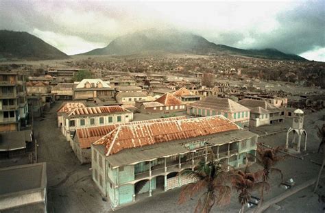 This is Plymouth, the former capital of Montserrat as it looked on 1997 after the volcano ...