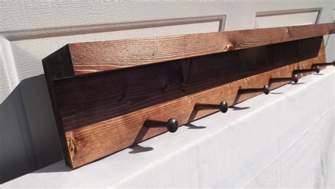 Reclaimed Wooden Shelf With Shaker Pegs Coat Rack by phyllissexton