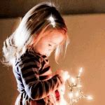 Little Girl with Christmas Lights