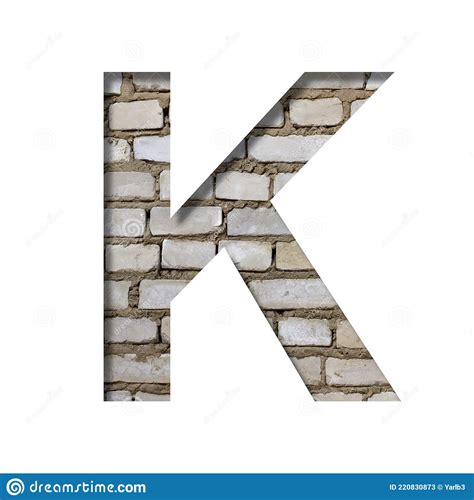 Font on White Brick. the Letter K is Cut from White Paper the Background of a Sloppy White Brick ...