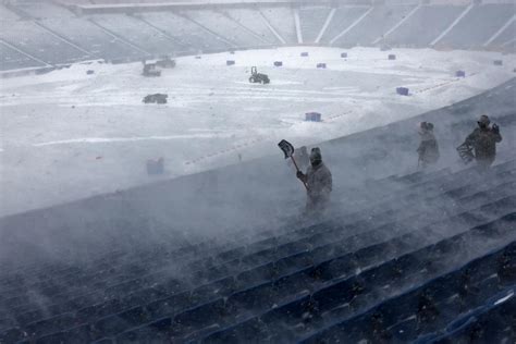 Bills fans help shovel out Highmark Stadium as 18 inches of snow falls ...