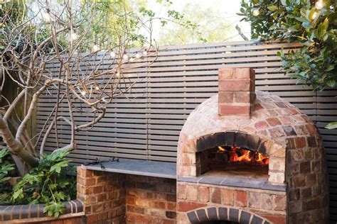 Installing a wood fired pizza oven in our garden | Outdoor fireplace pizza oven, Brick pizza ...