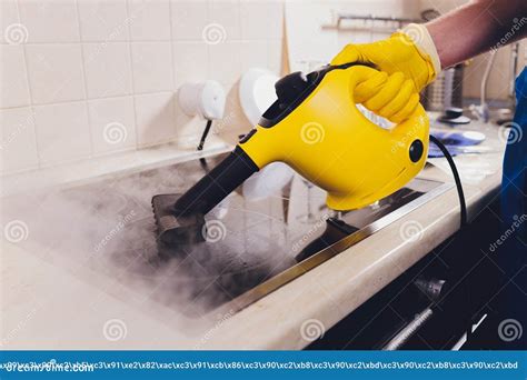 Cleaning Kitchen Hob with a Steam Cleaner. Stock Image - Image of stove ...