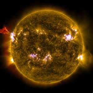 File:A burst of solar material leaps off the left side of the sun in what’s known as a ...