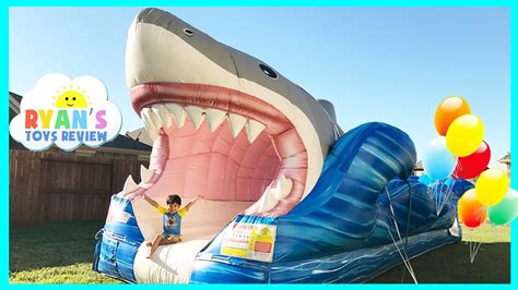 GIANT INFLATABLE SHARK WATER SLIDE FOR KIDS - YouTube