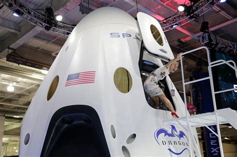 Elon Musk unveils spacecraft to ferry astronauts